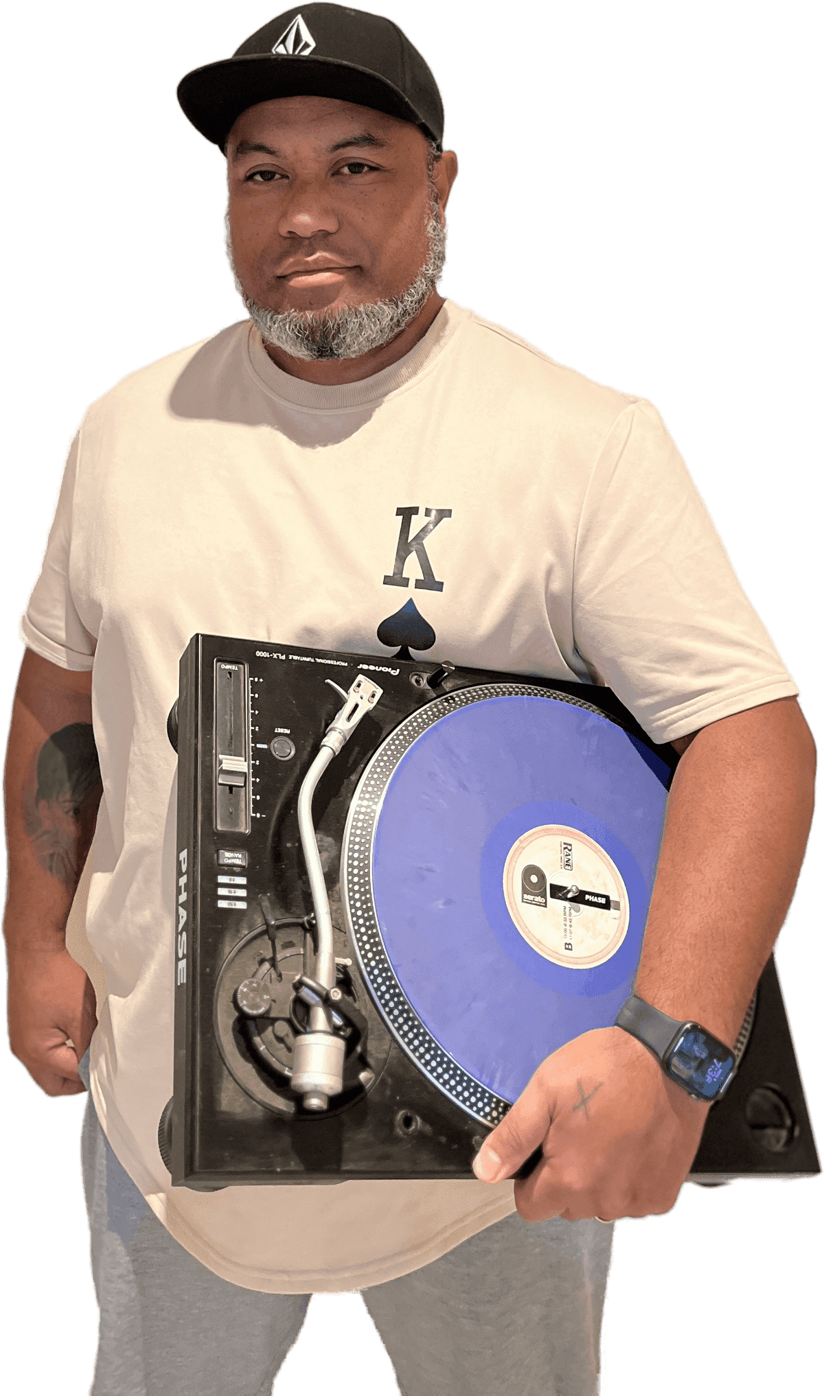 DJ Static holding a Pioneer PLX-1000 turntable